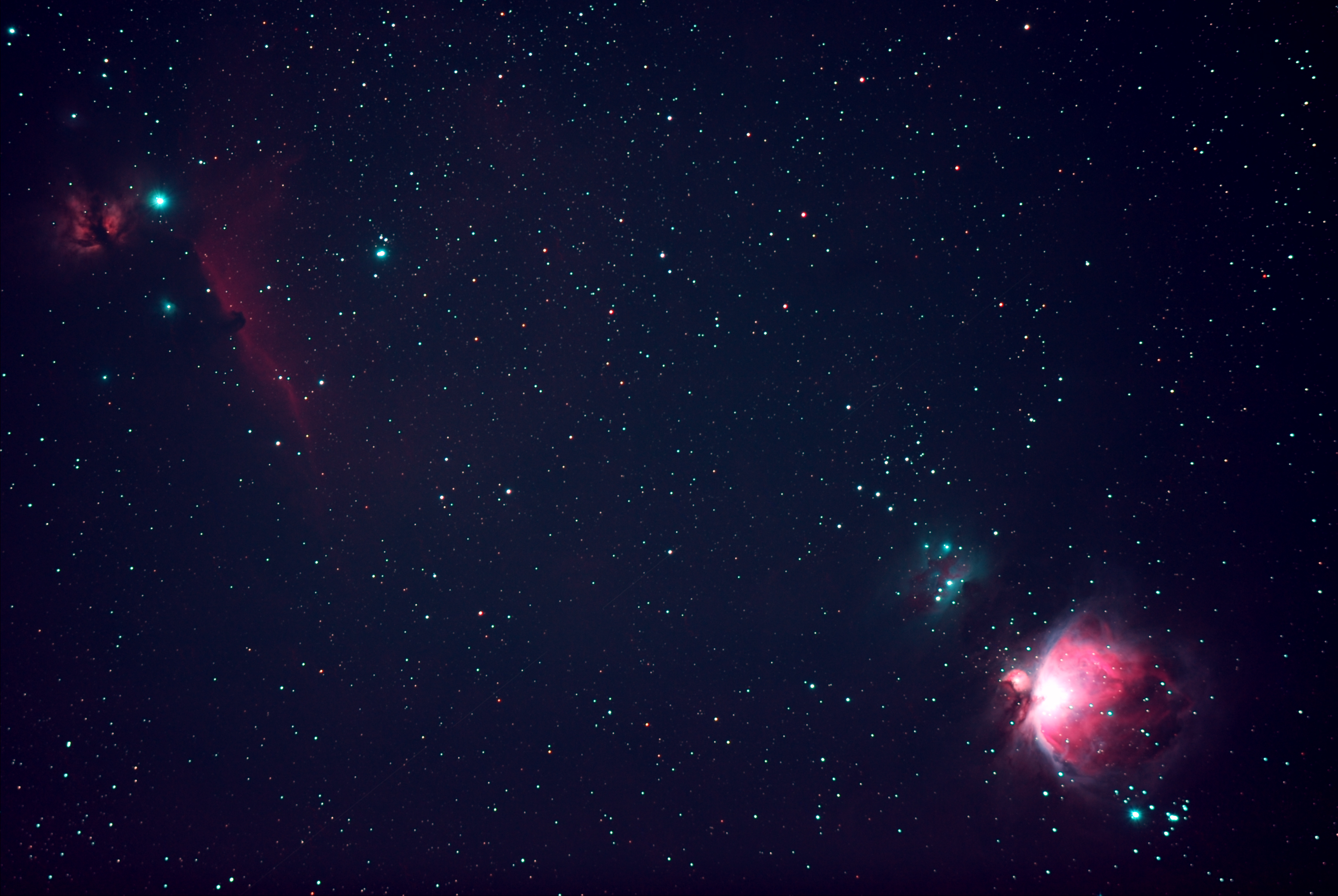Wide field view of the Flame, Horsehead, Running Man, and Great Orion Nebulas