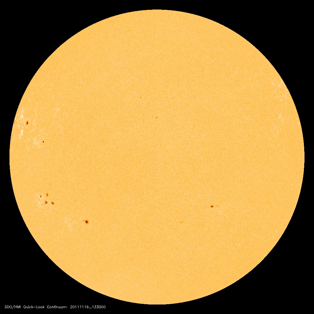 SOHO reference image showing small sunspots