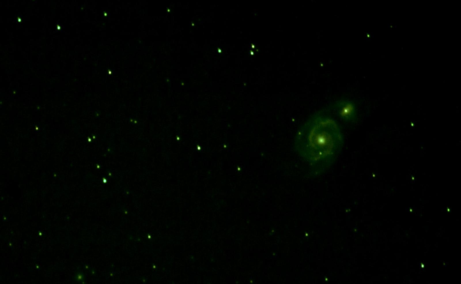 Second attempt at M51, the Whirlpool Galaxy, showing a slight green tint from light pollution filters
